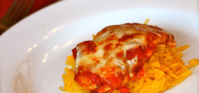 A single serving of Chicken Parmesan with Spaghetti Squash .