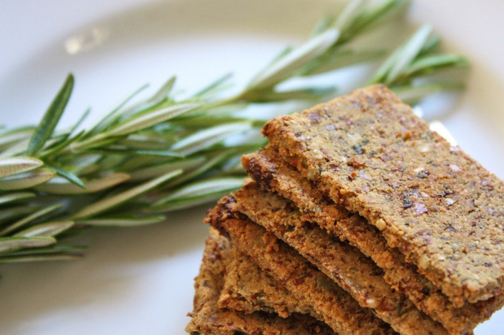 A plate of rosemary raisin almond pulp crackers.