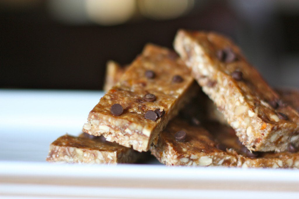 A plate full of dark chocolate peanut butter energy bars.