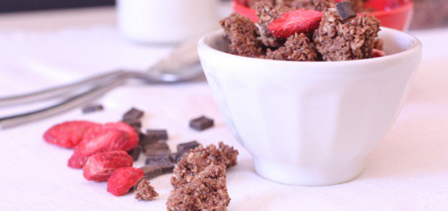 A bowl of breakfast Paleo Chocolate Granola with Dried Berries.