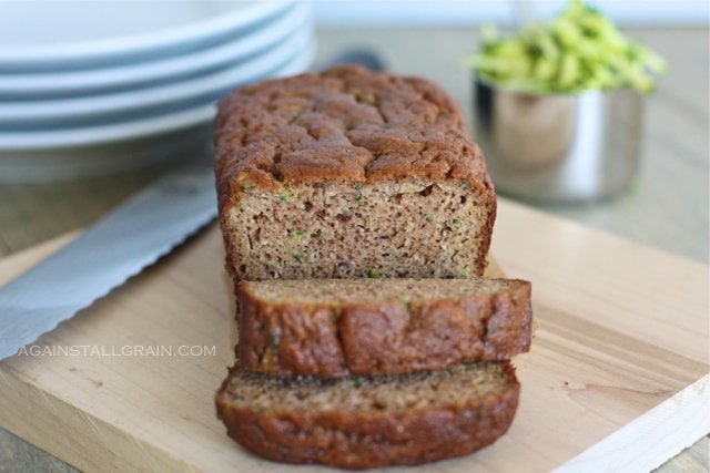 Almond Flour Zucchini Bread on a wood cutting board in home kitchen