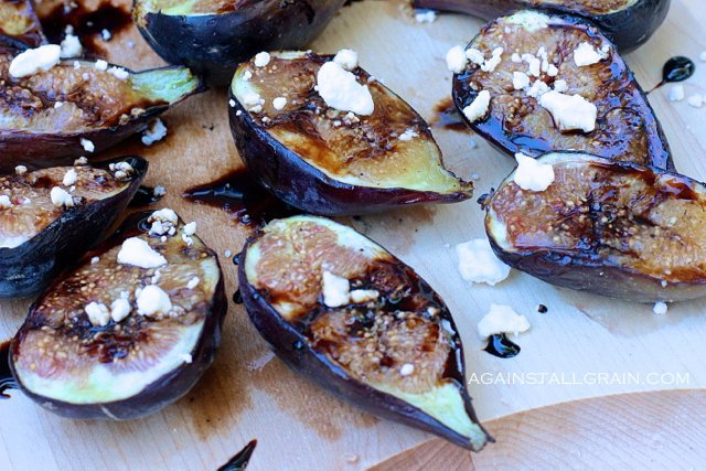 Grilled Fig halves topped with balsamic glaze and goat cheese.