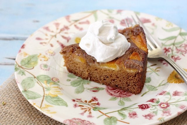 coconut whipped cream on a piece of pumpkin pie