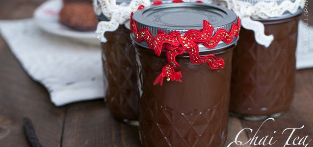 chai tea concentrate in a mason jar with holiday decorations