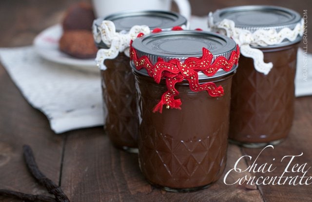 chai tea concentrate in a mason jar with holiday decorations