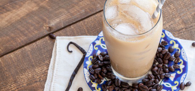 Refreshing glass of vanilla bean iced latte.