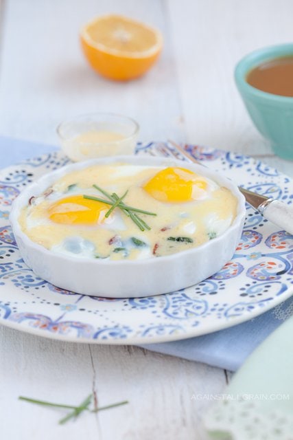 Bacon and Power Greens Baked Eggs with Hollandaise Sauce - by Against All Grain #paleo #glutenfree