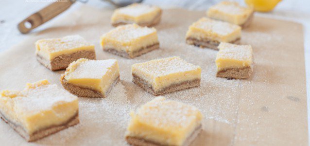 Lucious lemon bars dusted with powdered sugar with just the right amount of tang and sweetness!