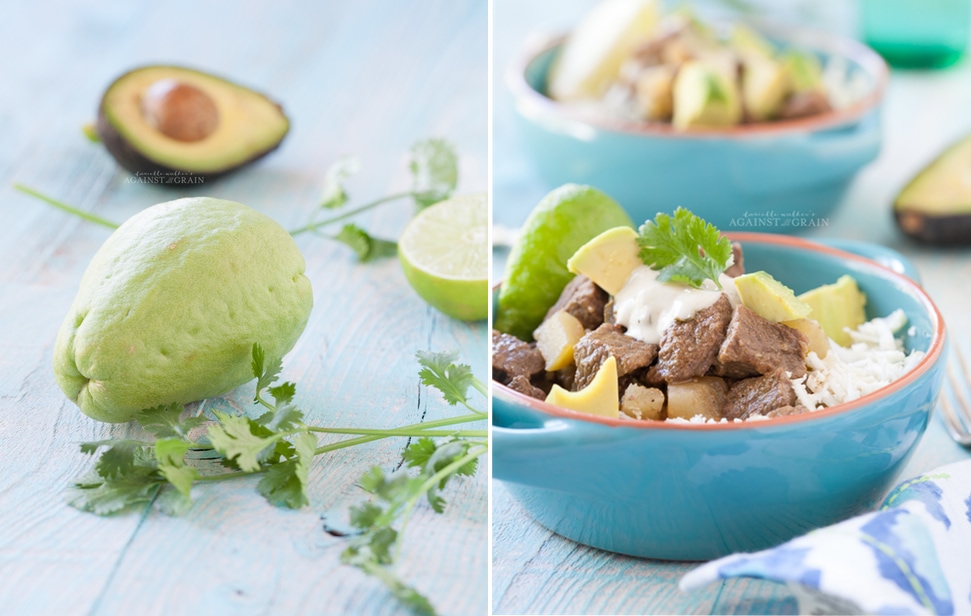 Crockpot Mexican Stew served over cauliflower rice and a side of fresh avocado. Served in a blue bowl on a light blue wooden table and a picture of a Chayote squash