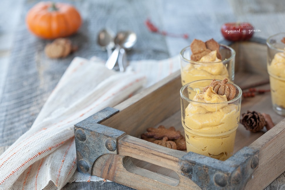 dairy free pumpkin pudding dessert in a small glass cup on a tray