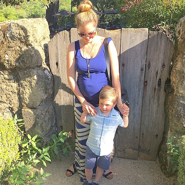 Looking_back_through_photos_from_our_vacation_and_even_though_he_s_not_looking__this_is_one_of_my_favorites.__He_requested_a_winery_your_to_see_how_wine_was_made_and_he_was_so_cute_soaking_in_every_word_the_tour_guide_was_saying__He_even_learned_to_s