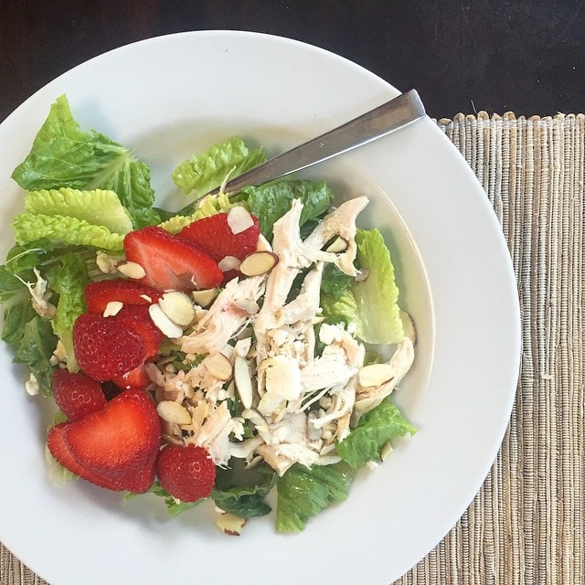 An_organic_rotisserie_chicken_from__Wholefoods_over_salad_with_strawberries__almonds__and_goat_cheese._Easy_peasy_for_a_hot__long_day.___aageats__againstallgrain__glutenfree