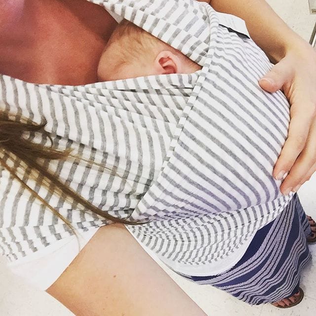Successful_trip_to_Target_with_both_boys_thanks_to_the__sollybabywrap___He_loves_being_snuggled_up_close_to_my_chest_and_Asher_likes_that_he_still_gets_to_hold_my_hand.