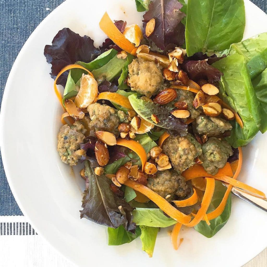 Lunch._Pesto_meatballs_with_my_spicy_Thai_dressing_and_spicy_candied_almonds.__danielleeats__againstallgrain