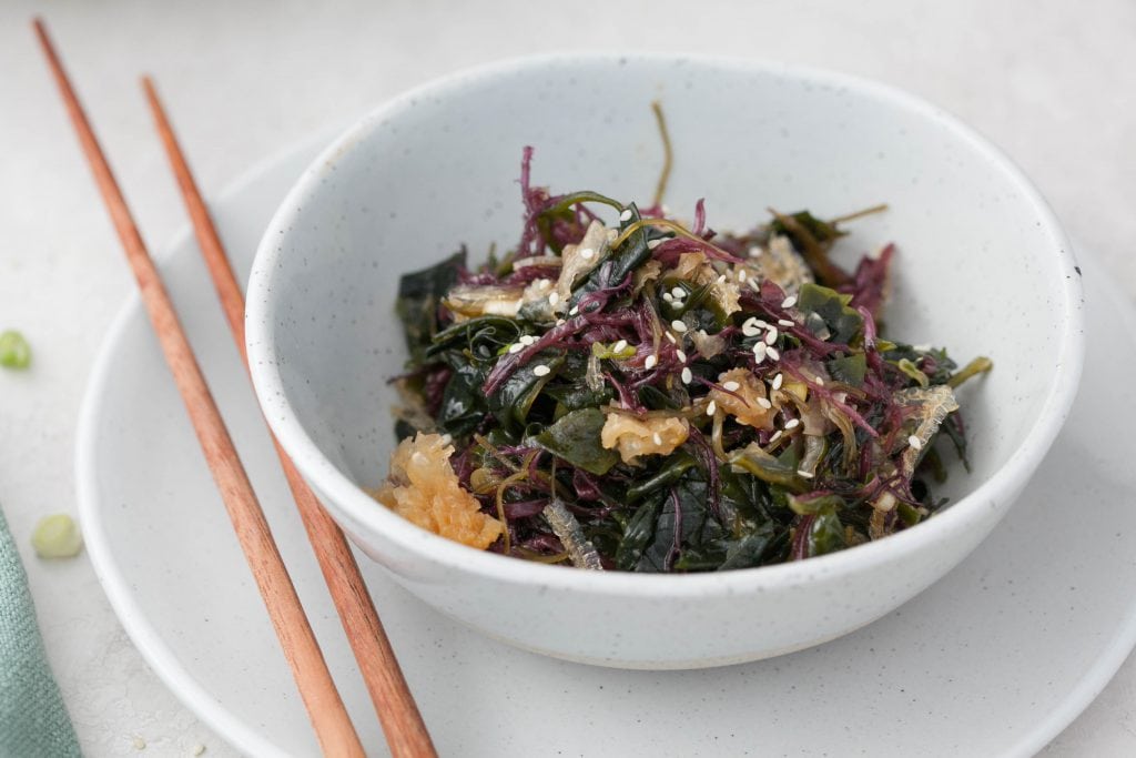 A bowl of seaweed salad made with healthy ingredients and is gluten free.