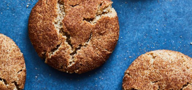 Gluten Free Snickerdoodle Cookies that are moist on a blue background.