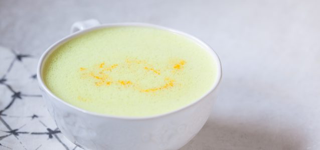 A steaming cup of turmeric bone broth latte.