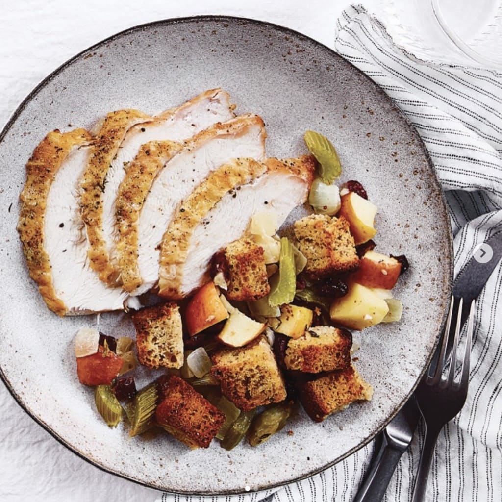 Thanksgiving dinner plate of sliced turkey and stuffing