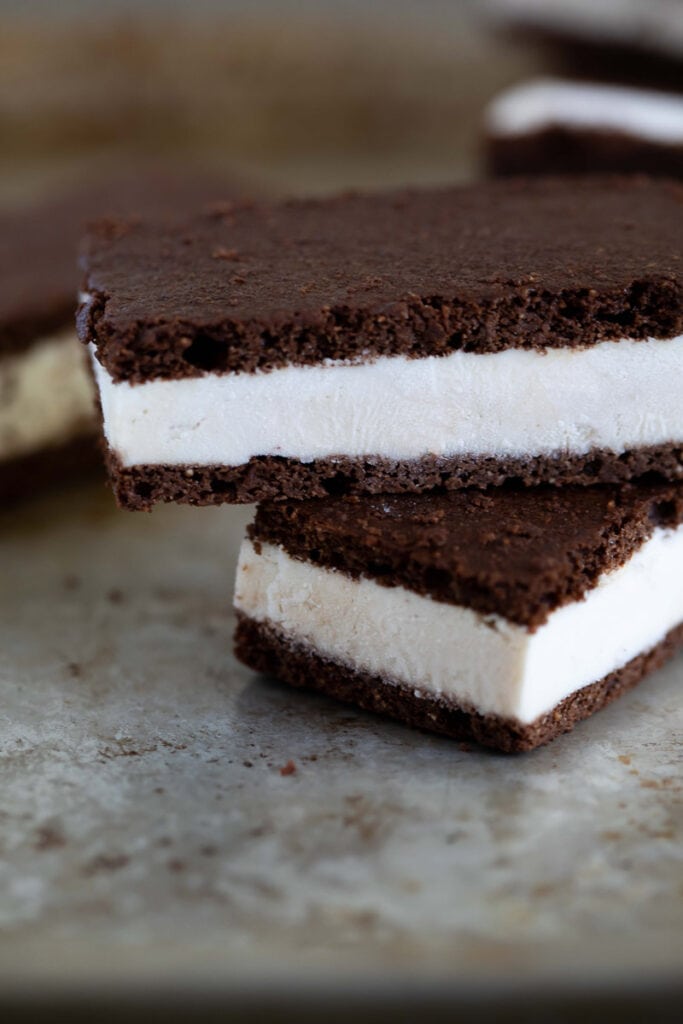 up close view of two ice cream sandwiches on top of each other 